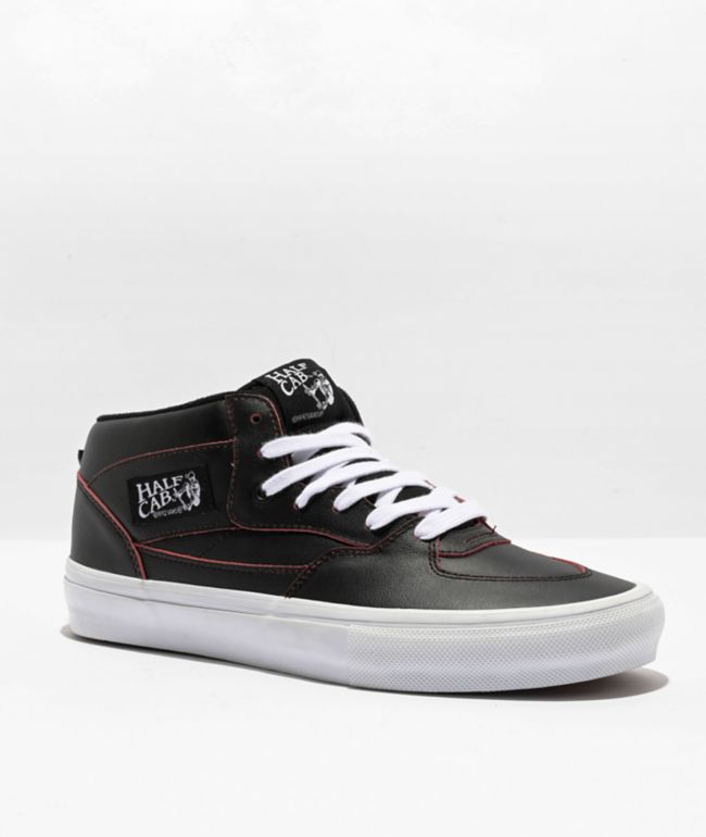 Half black half 2024 white slip on vans