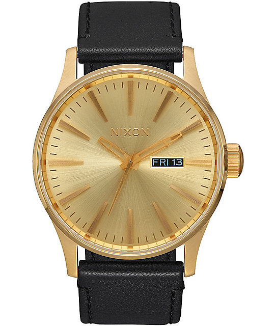 gold and leather watch