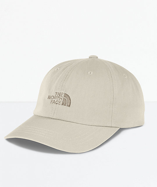 beige strapback hat