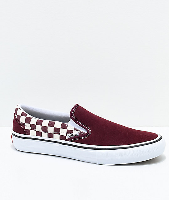 Burgundy checkered slip on store vans